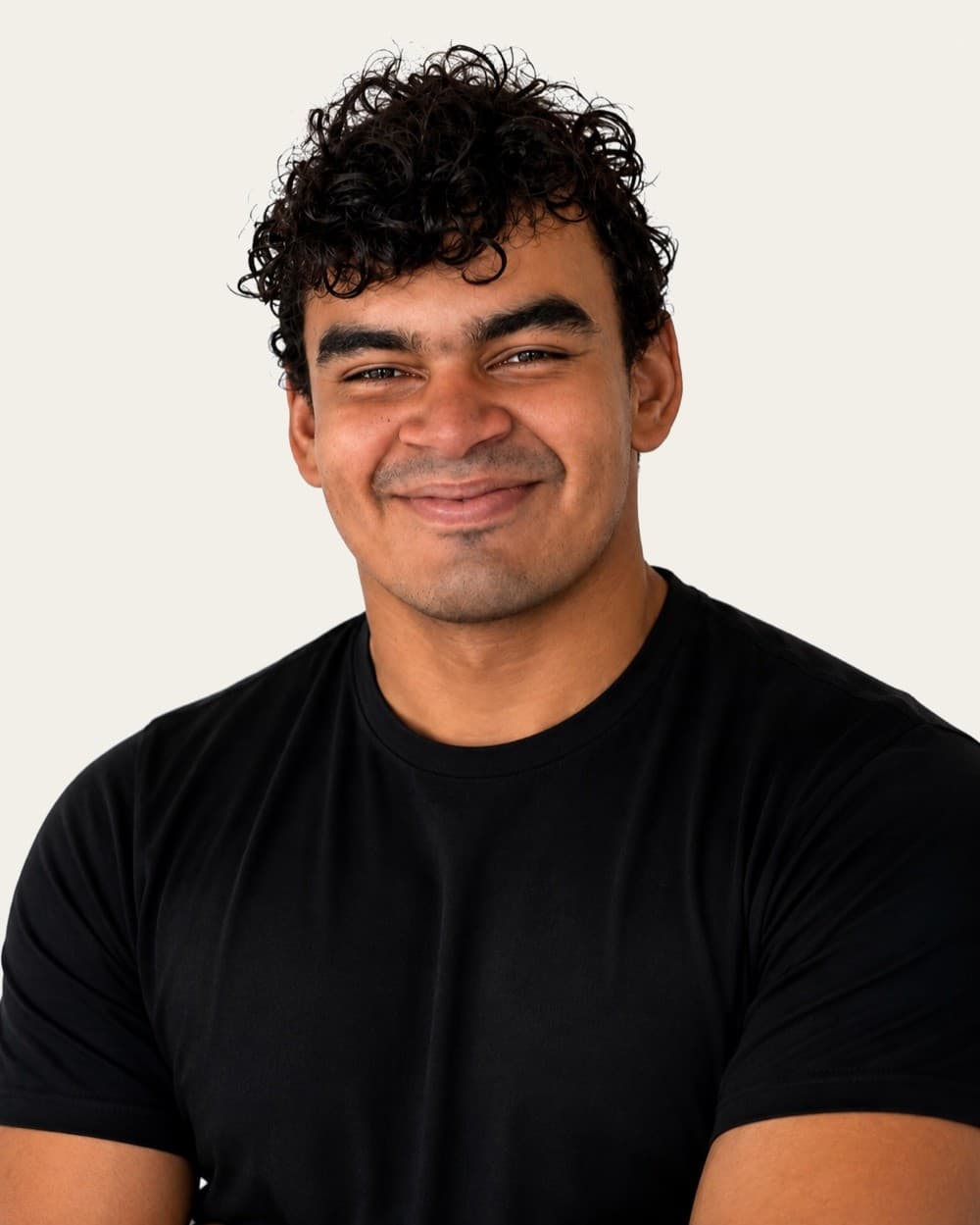 Sebastian Uzice, founder of UZICE STUDIO, photographed against a plain white background